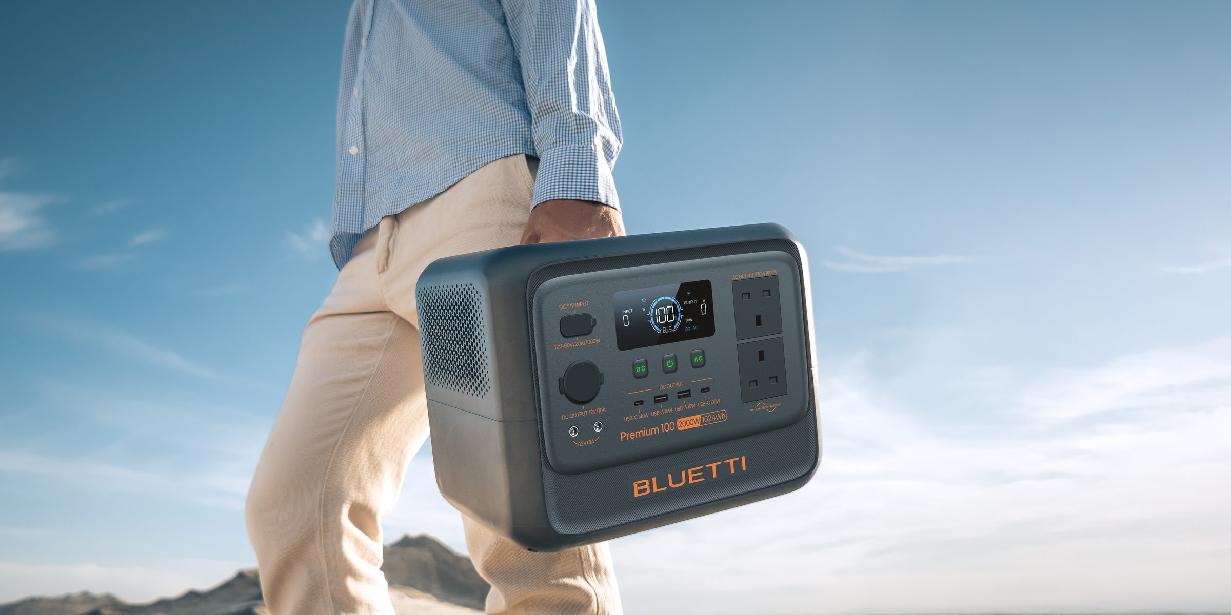 A portable BLUETTI power station carried to a remote site